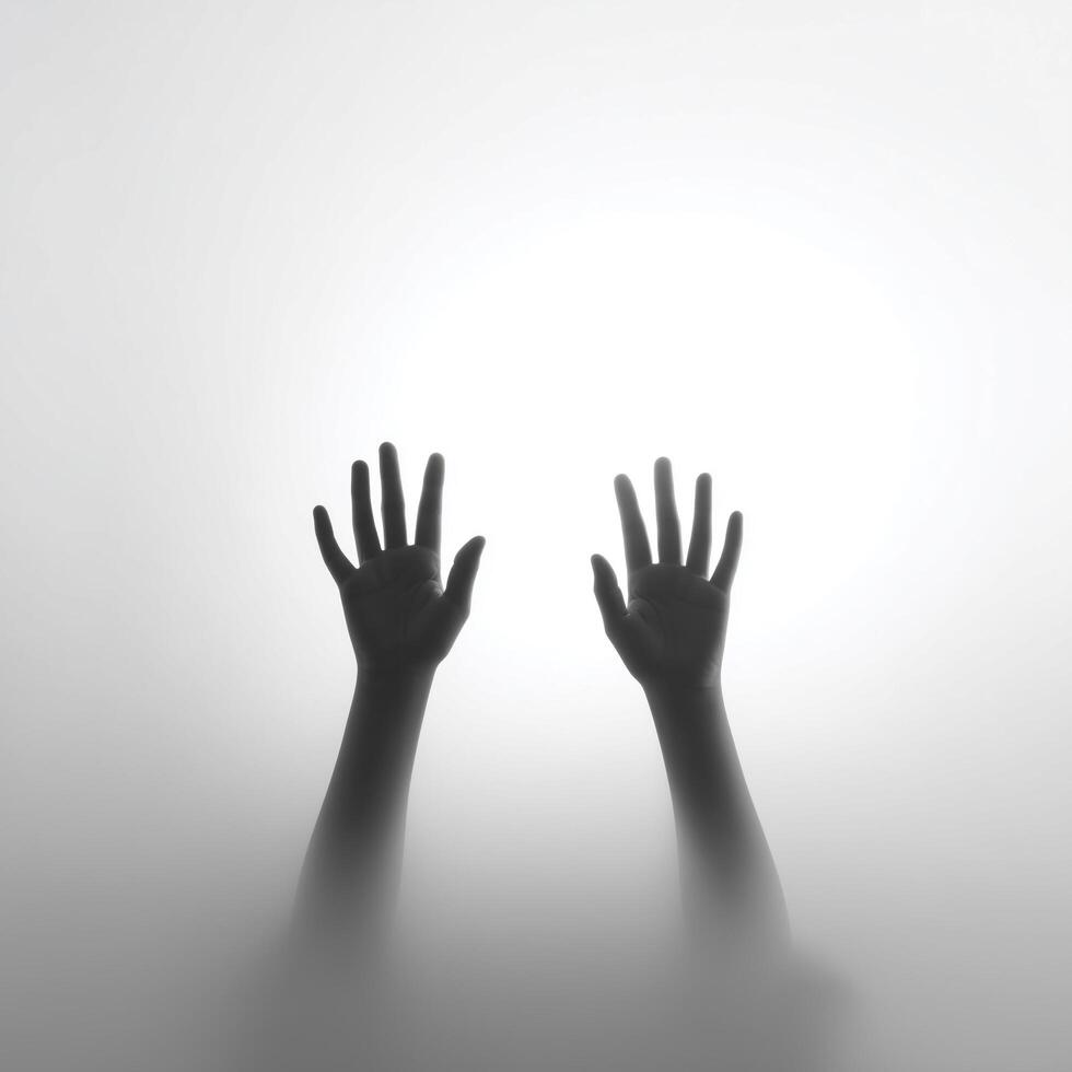Two hands of man are shown in a blurry image photo
