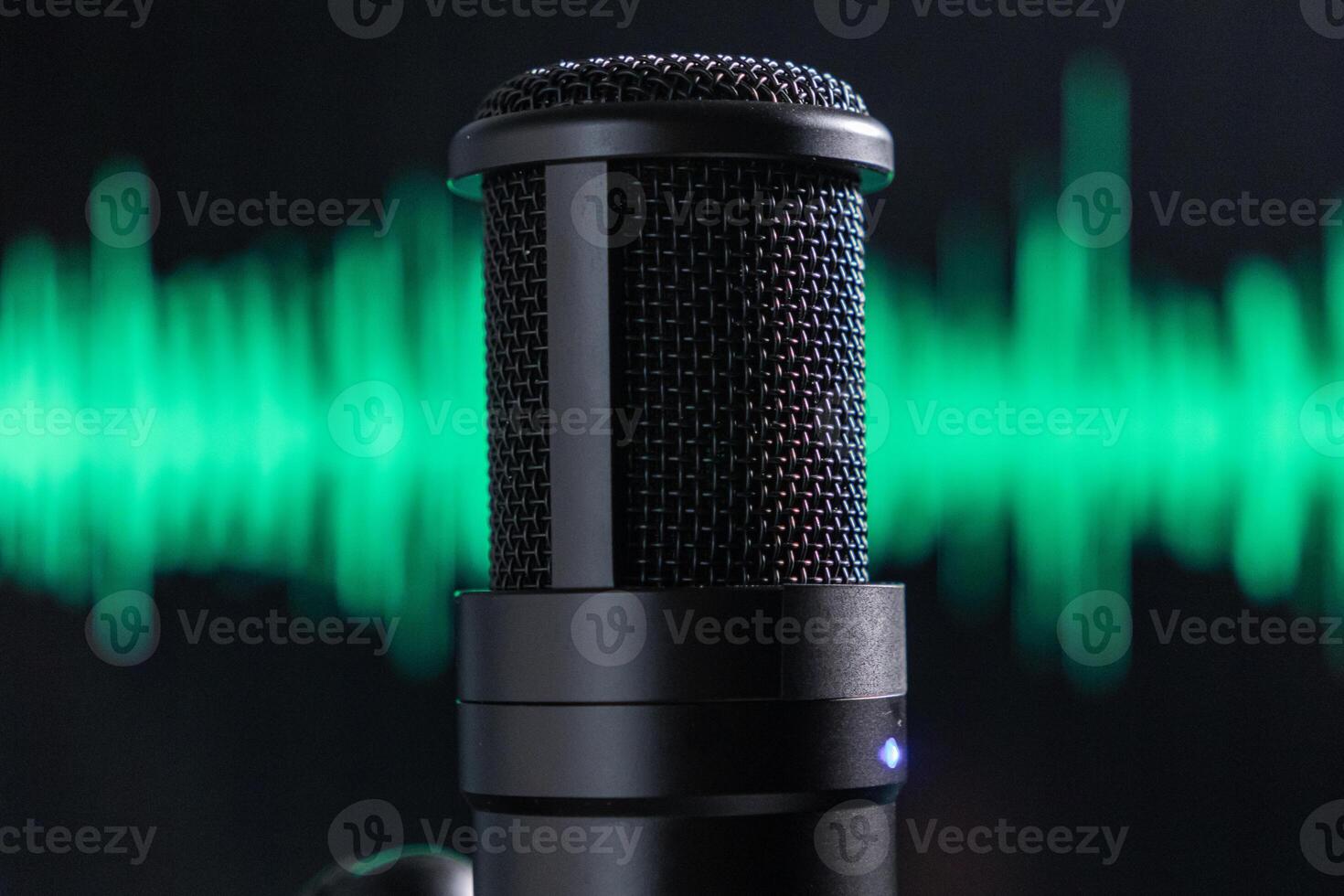Professional studio microphone with a green audio waveform in the background, close-up shot for sound recording theme photo