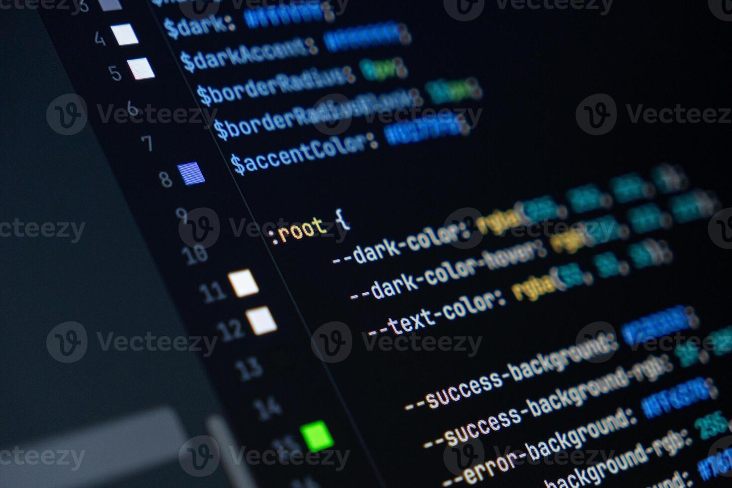 close-up of computer screen with colorful css code, focus on root selector, web development, frontend design and programming photo