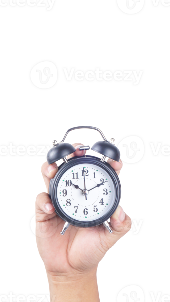 Hand holding black classic alarm clock isolated on transparent background png