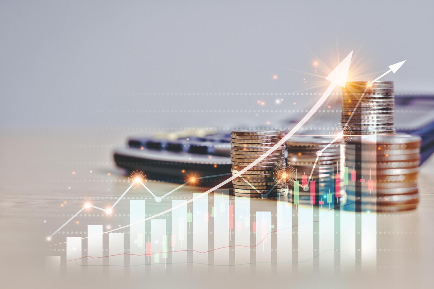 Financial market trade chart, Arrow symbol Demand line on stack of money coins, arranged as a graph shown in the virtual screen. Concept of financial business and economic exchange rates is growing photo
