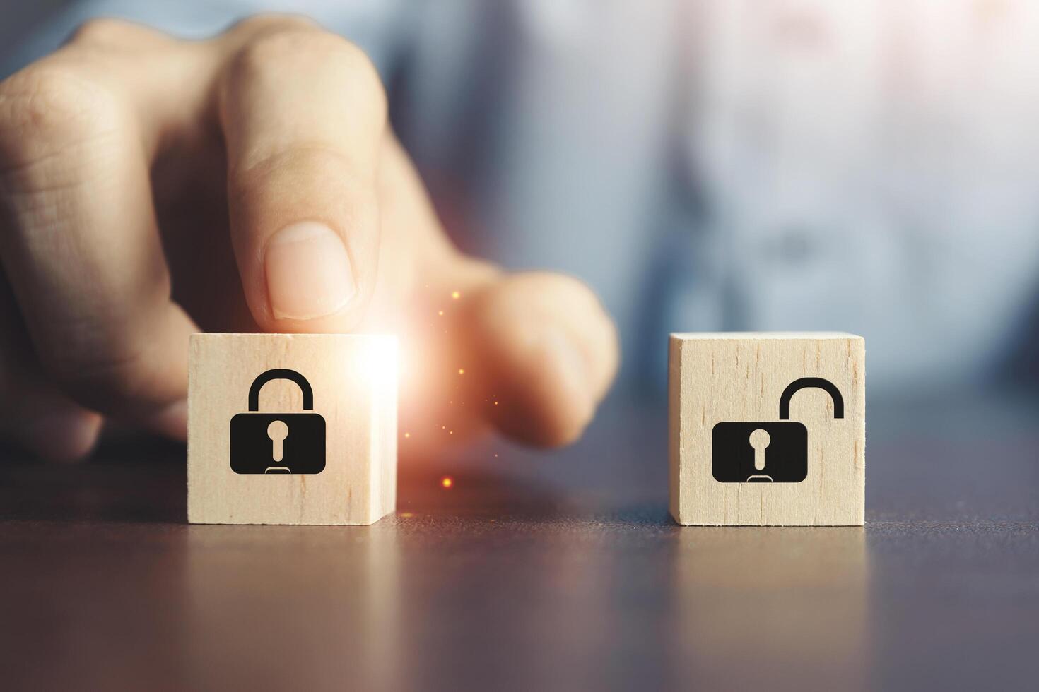 Lock icon on a wooden block wiht Cyber security concepts photo