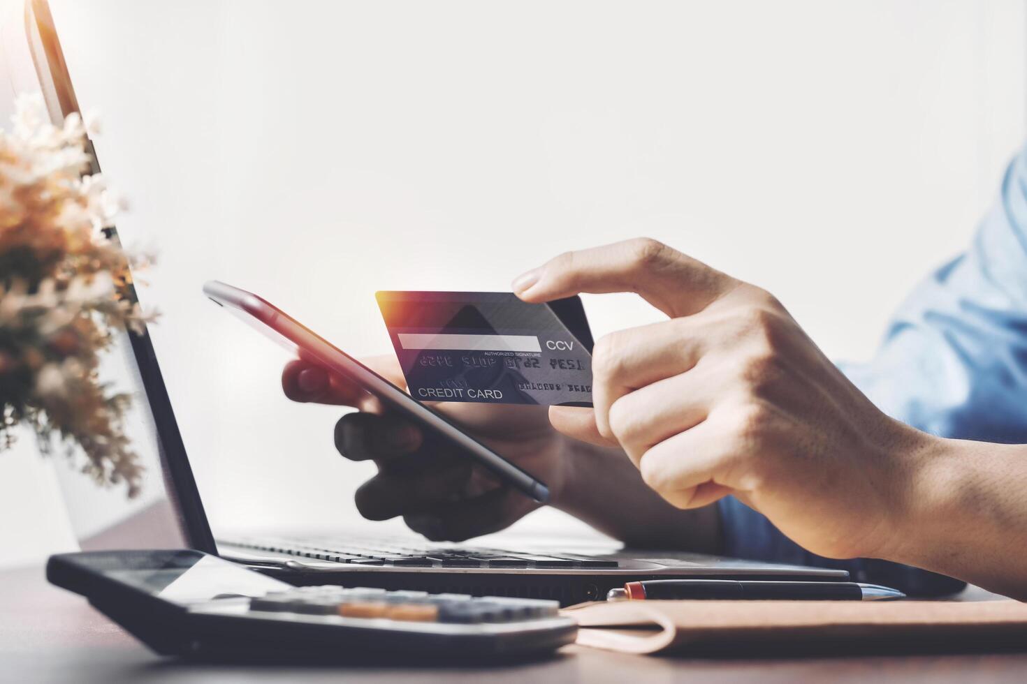 People use credit cards, user data entry, and codes for electronic payment technology for online with copy space. shopping lifestyle, or mobile phone financial application concept, credit card mockup photo