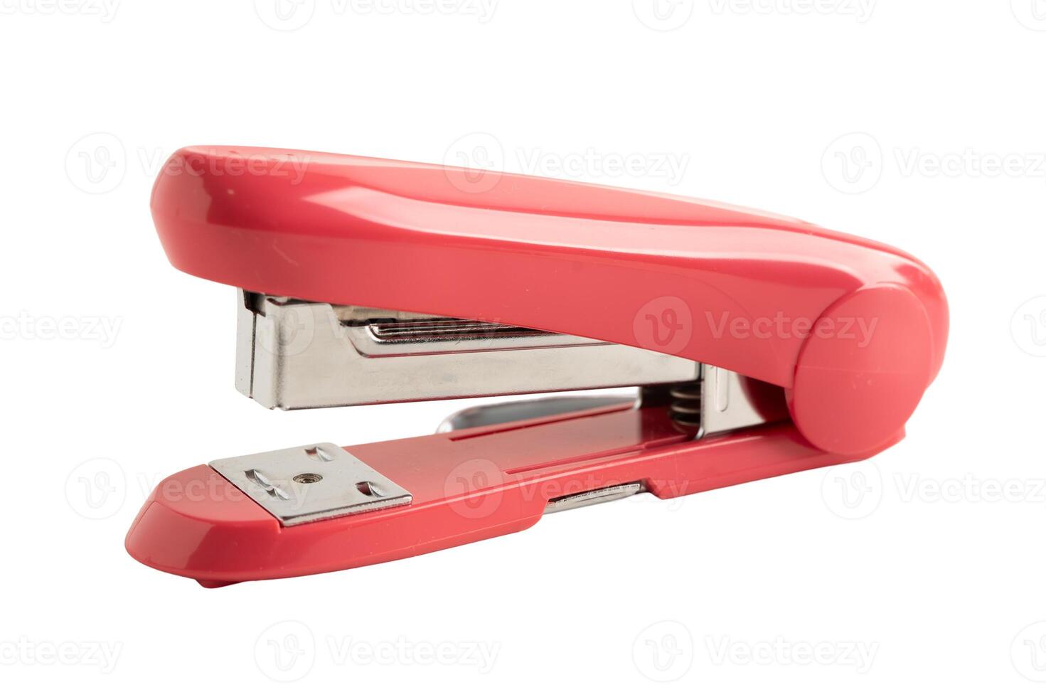Stapler red pink color isolated on white background. photo