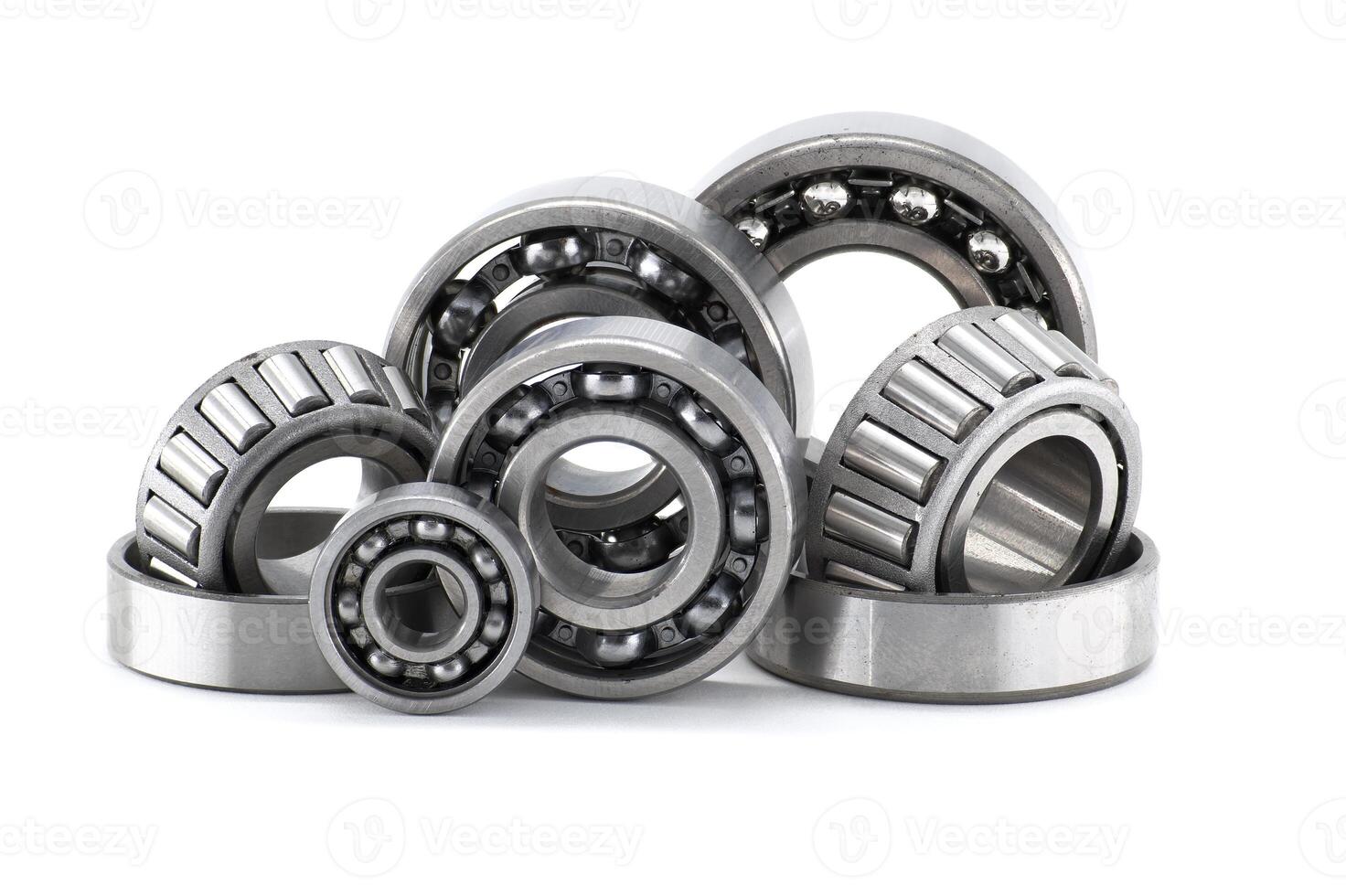 Assortment of various bearings isolated on a clean white backdrop, close up details. photo
