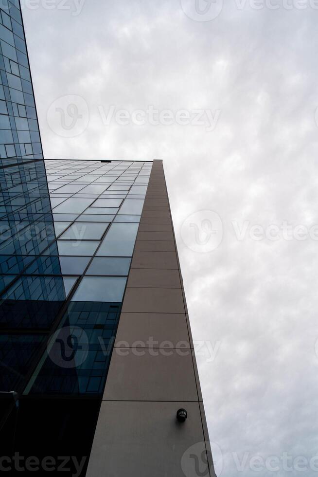 Glass Tower with Sky Reflection in Modern Architecture photo