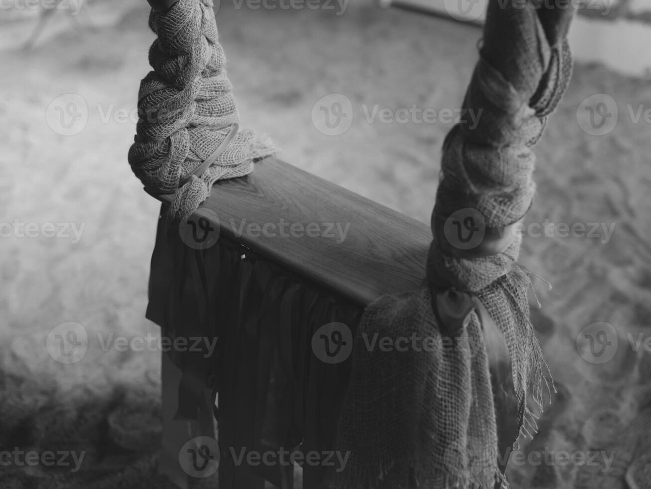 A lonely swing set in an abandoned playground, evoking nostalgia and desolation photo