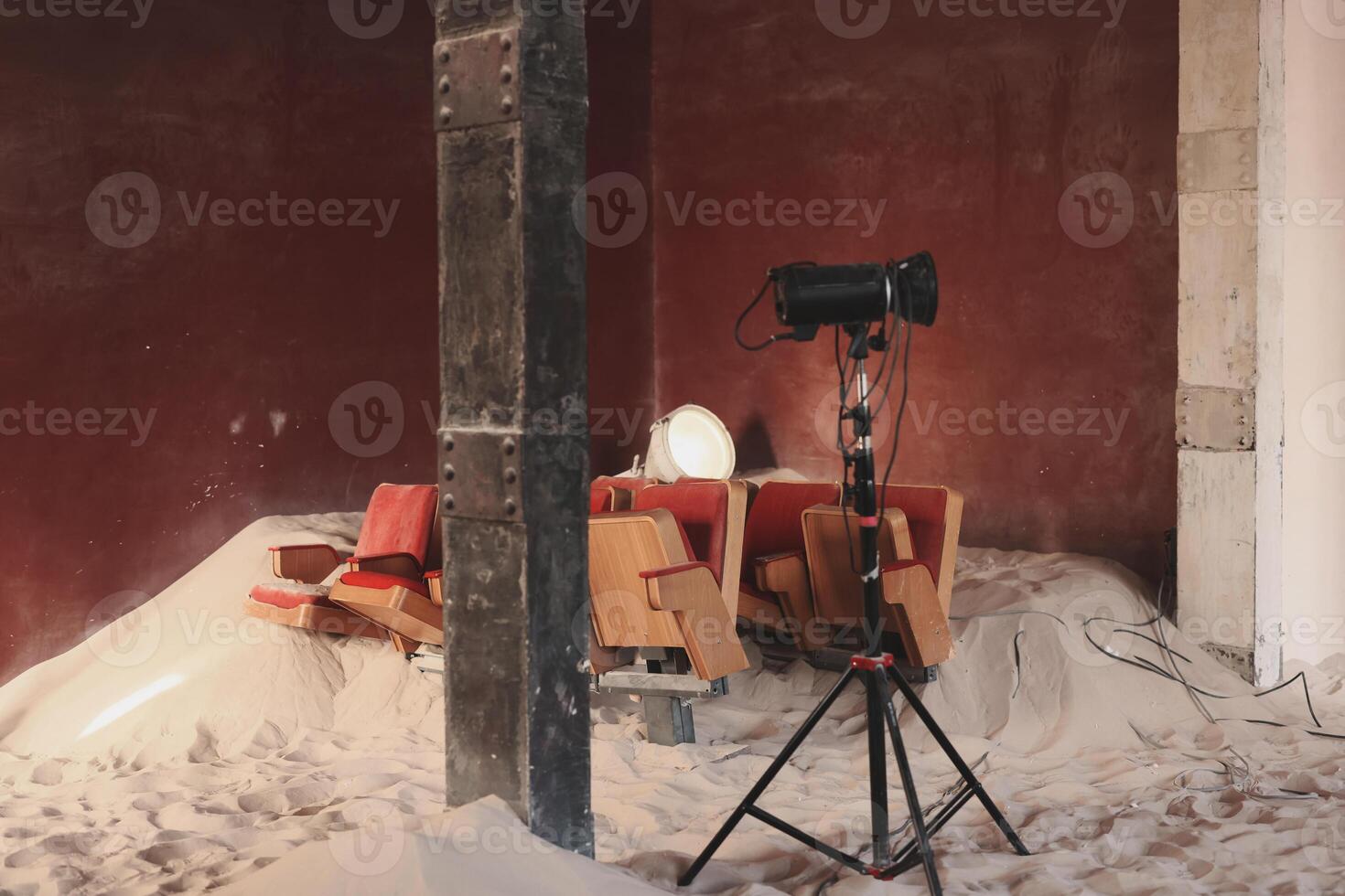 An Abandoned Space Filled with Vintage Furniture and Various Studio Equipment Items photo