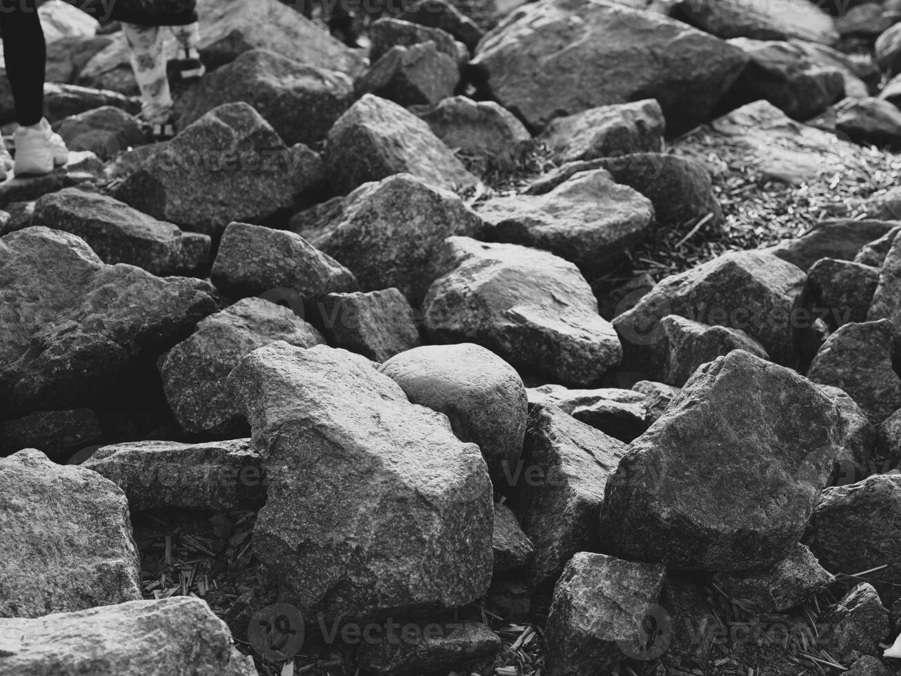 Rocky Terrain A Detailed CloseUp of Natural Stones in the Wild and Untamed Outdoors photo