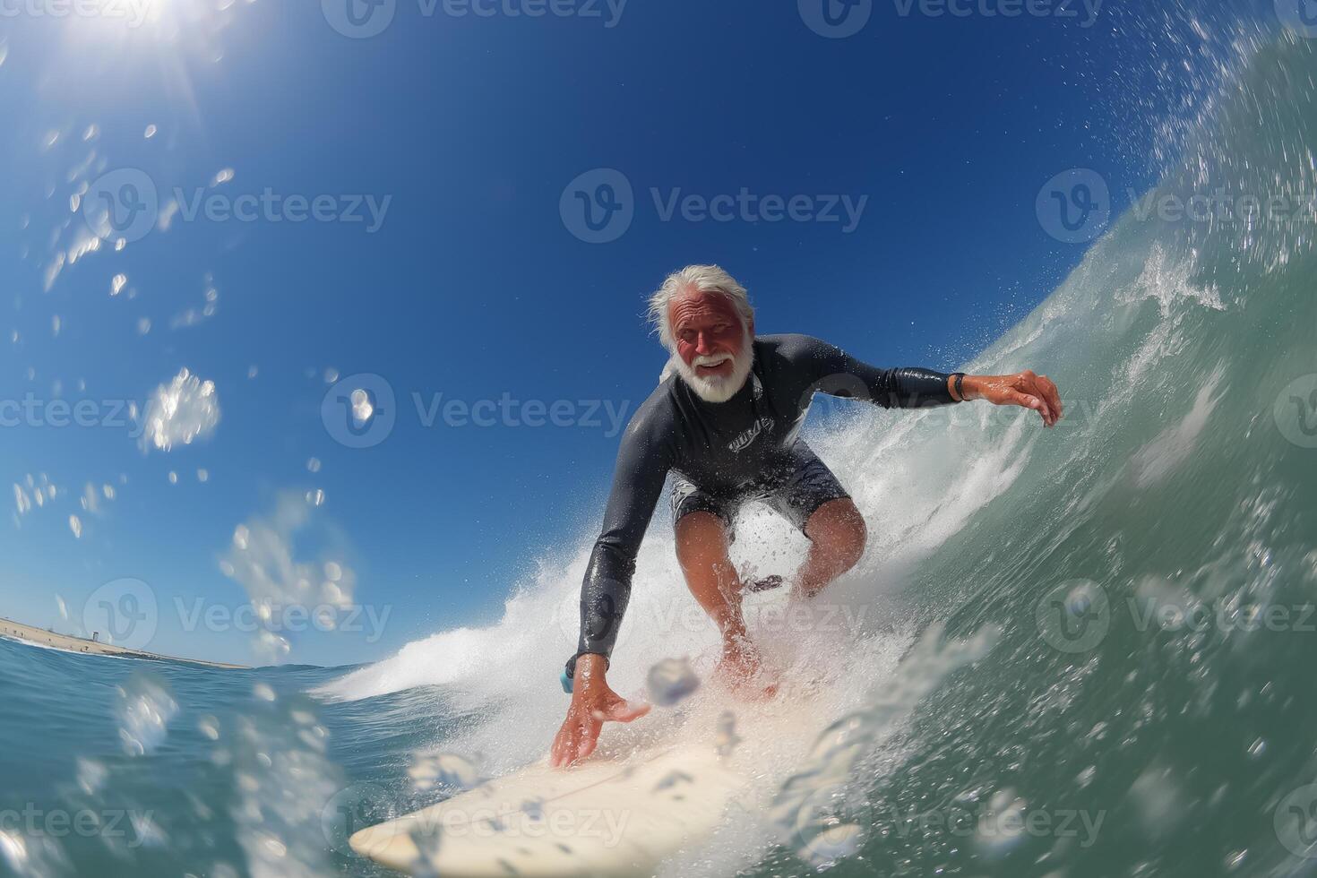 An older man surfing on a white surfboard photo