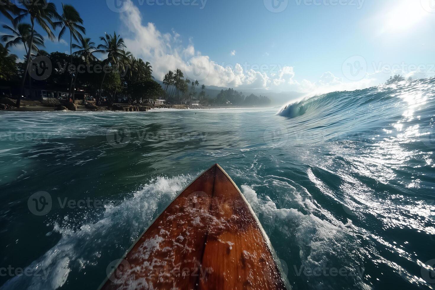 A surfboard is riding a wave in the ocean photo