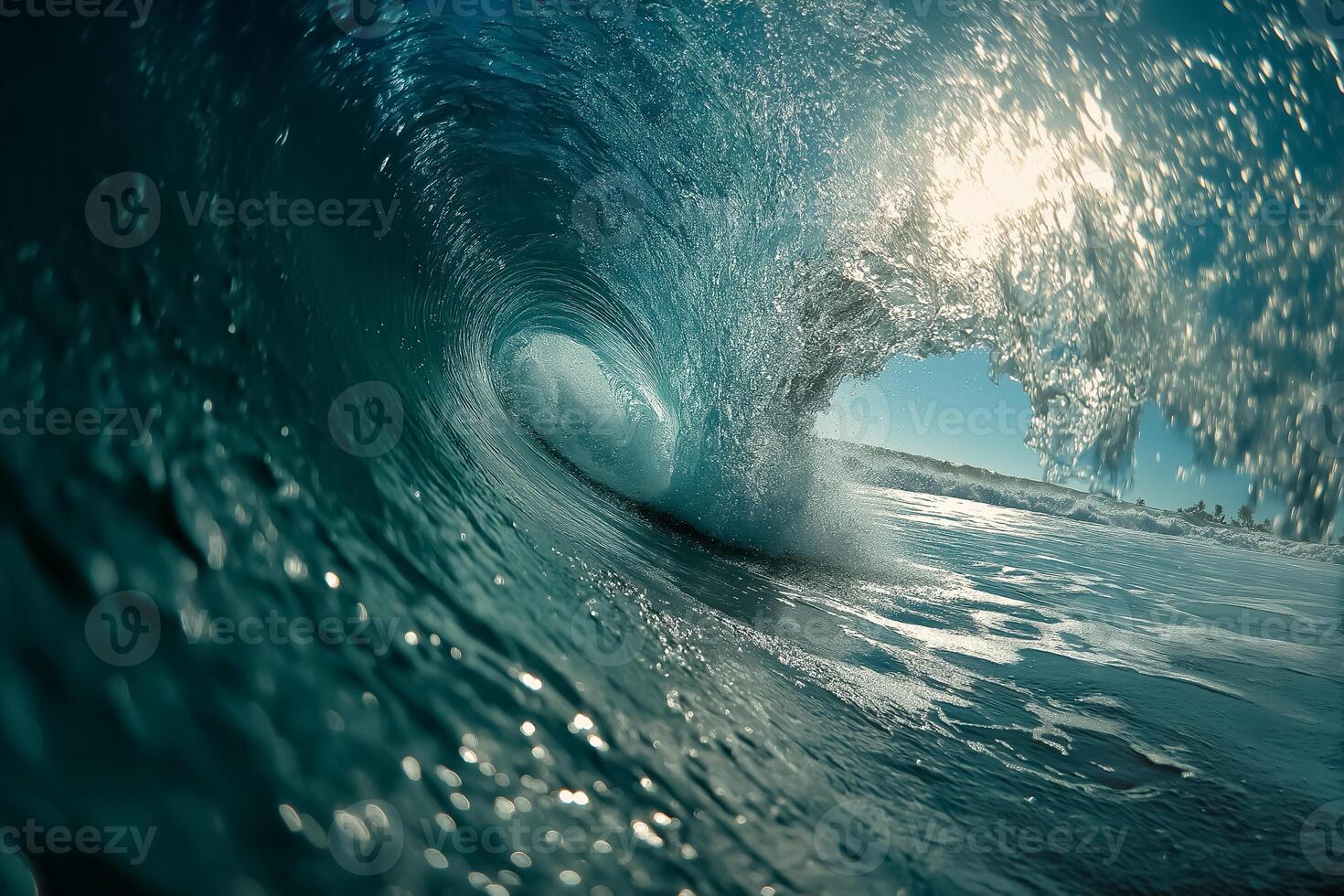 A wave breaking on the ocean with the sun shining through photo