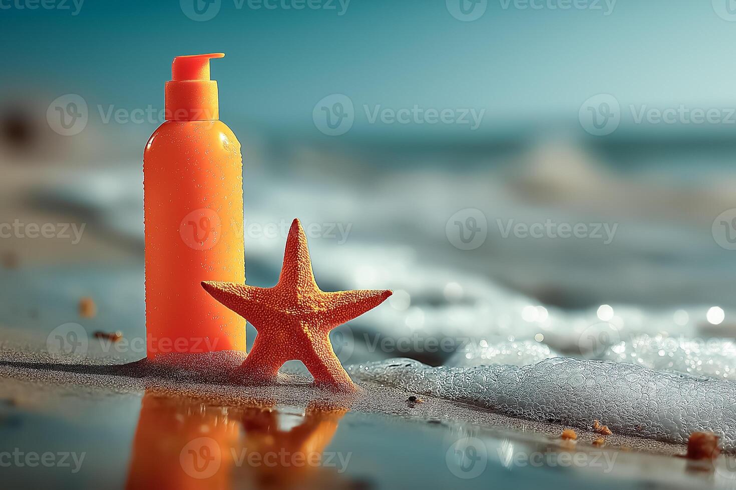 An orange bottle of sunscreen and starfish on the beach photo