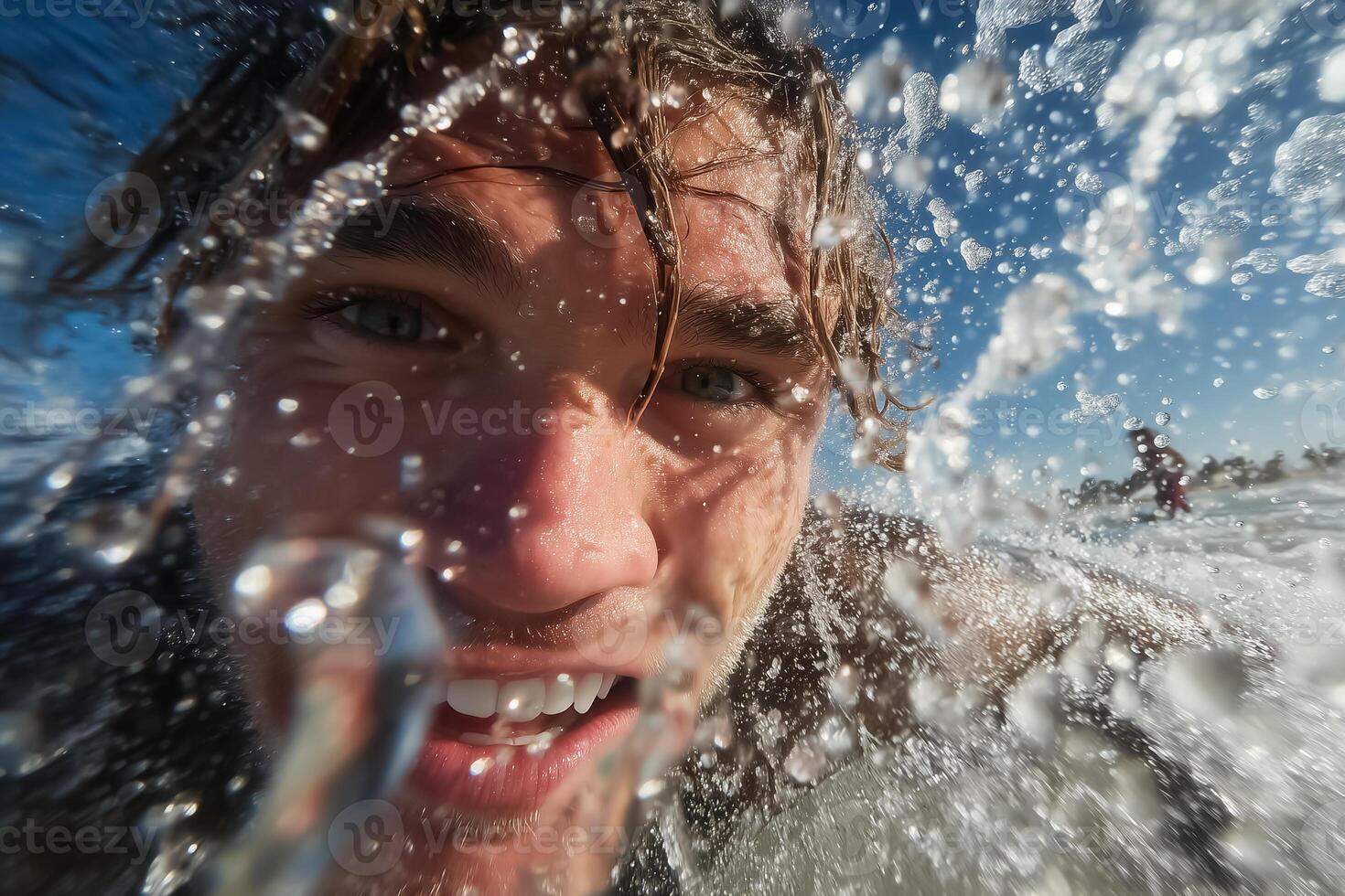 A man is swimming in the ocean and his face is in the water photo