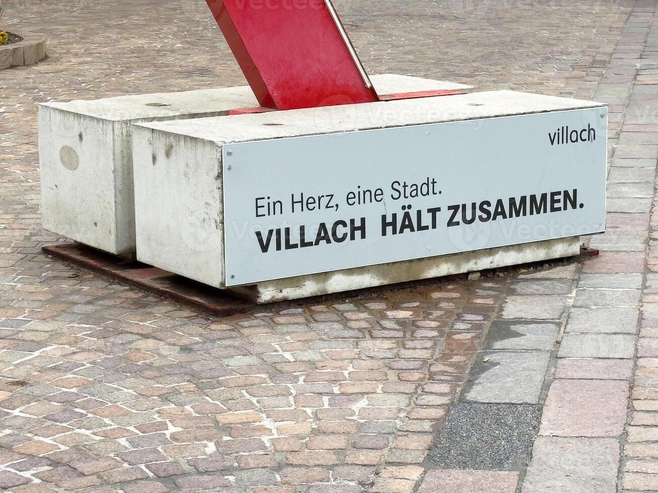 Villach sculpture base on cobblestone with heartfelt message photo