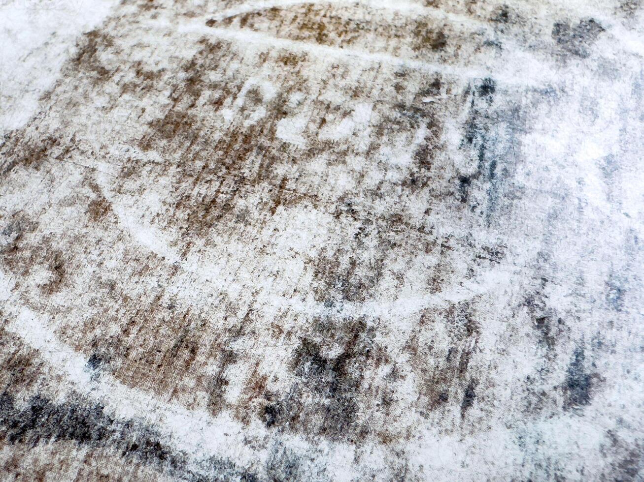 Abstract textured surface with brown and white patterns photo