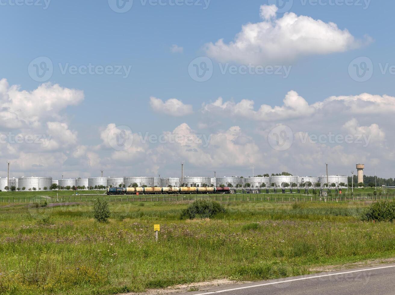 Industrial oil in a petrochemical tank with gasoline photo