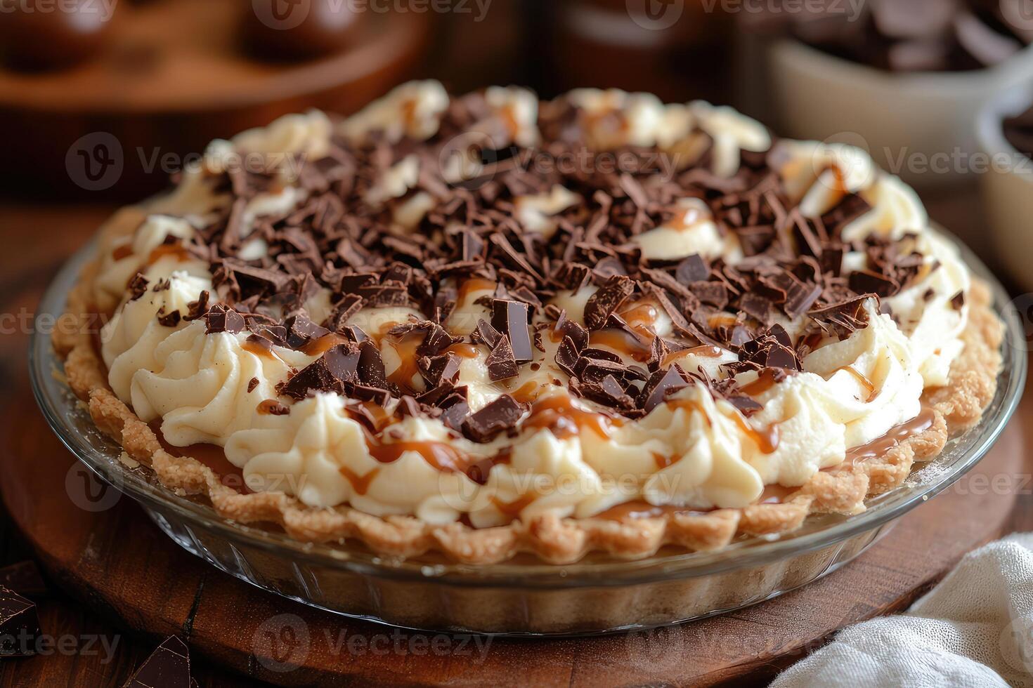 A pie with chocolate and cream on top photo