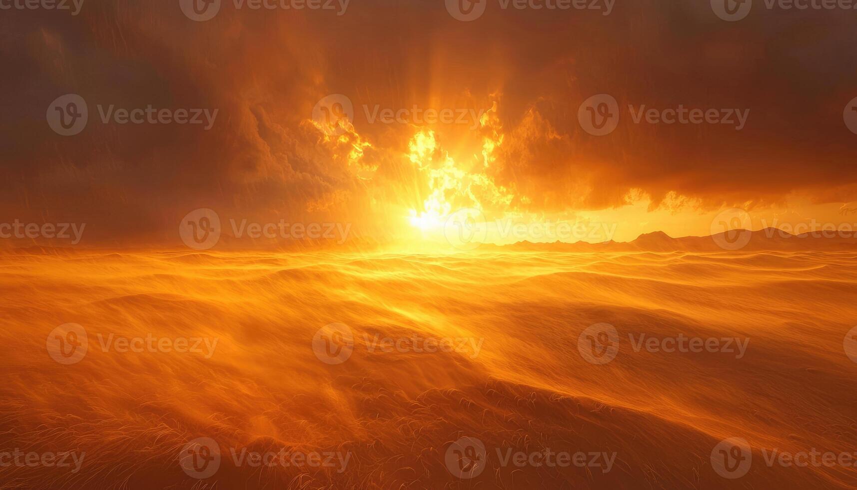 A sunset over the ocean with a large wave photo
