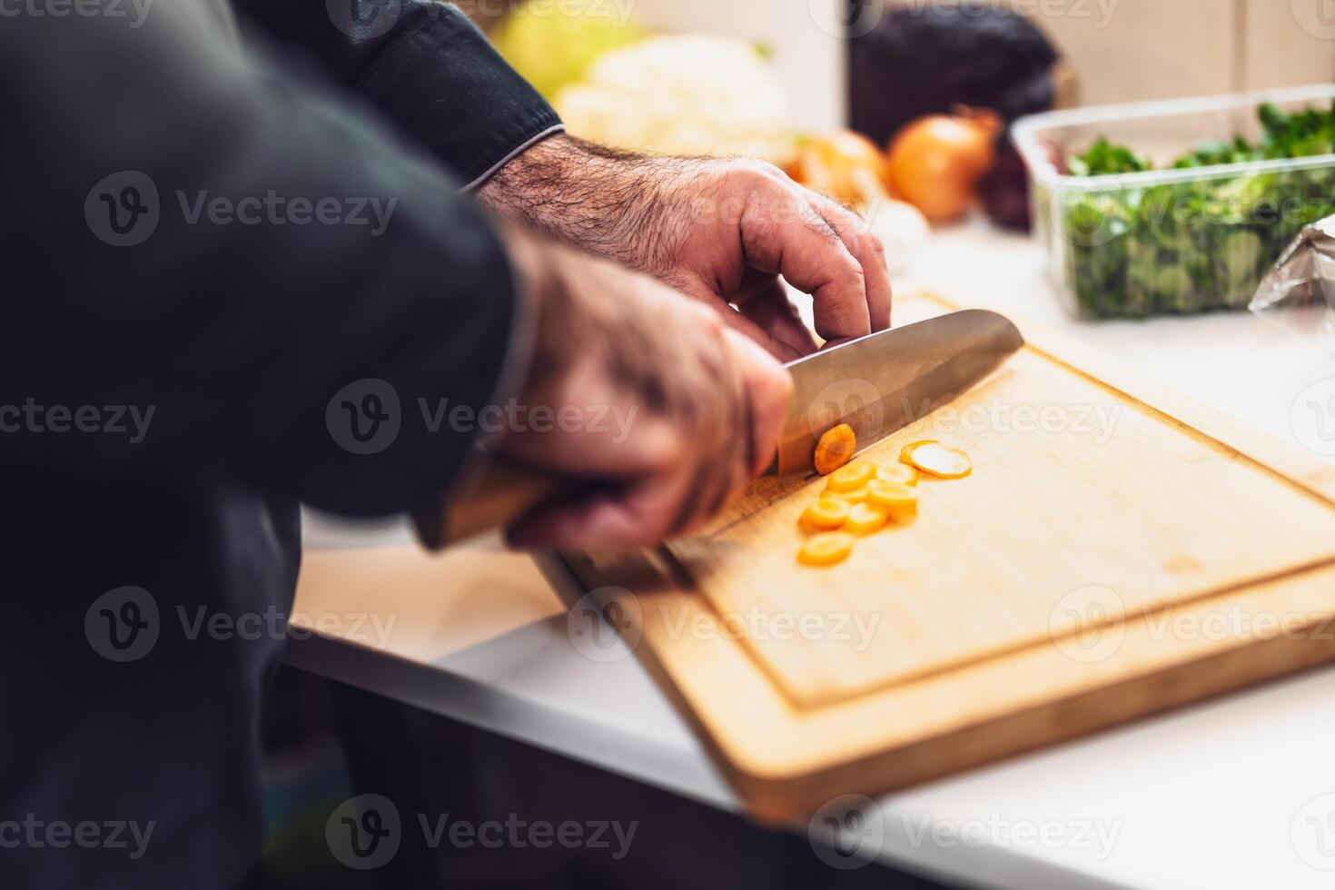 Healthy eating preparation in restaurant kitchen, chef slicing vegetables with focus and precision. photo
