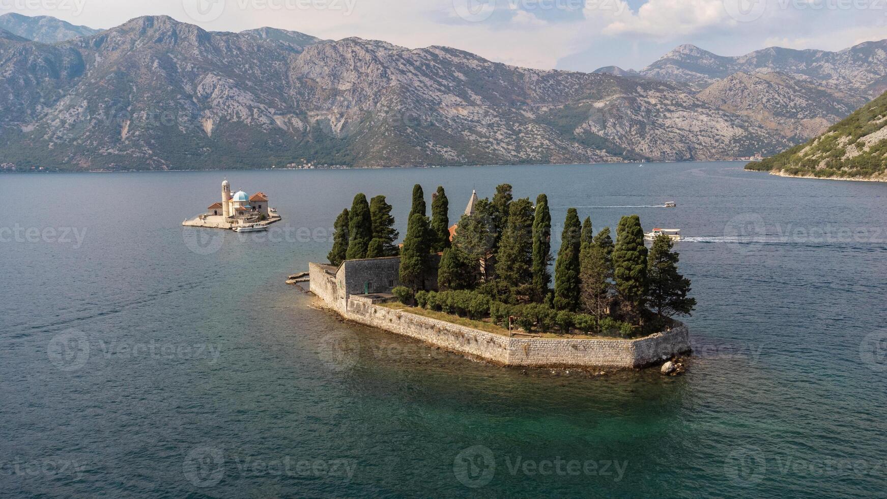 Aerial view of St. George Island with the island with the church of our lady of the rocks. Tourist attraction of the ancient monastery on the island near Perast, in the Bay of Kotor, Montenegro photo