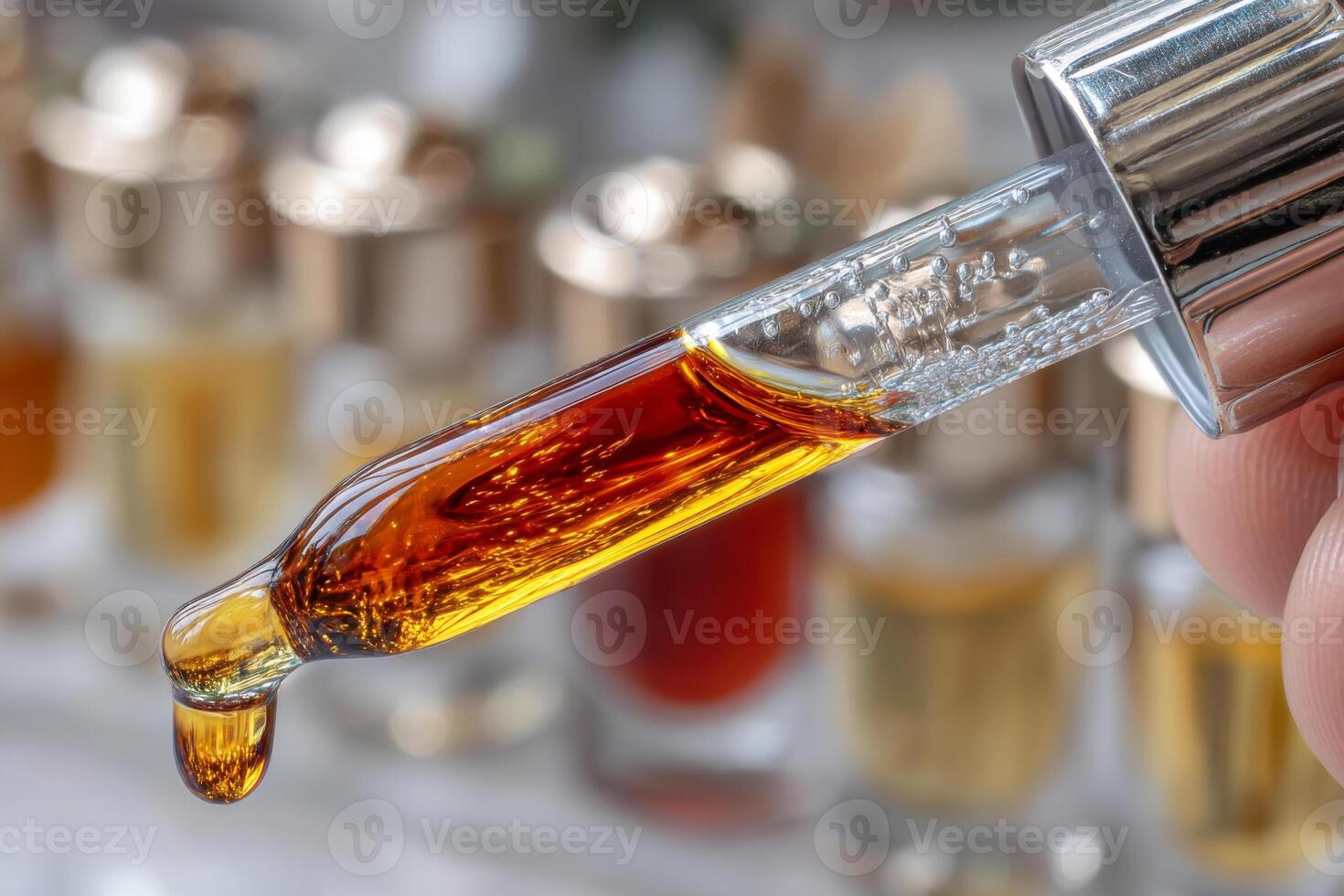 Pipette with essential oil and blurred cosmetic bottles in background photo