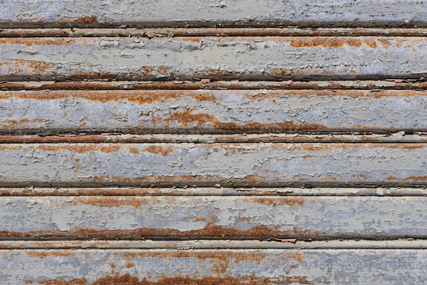 Rusty Painted Metal Panels with Peeling Texture photo