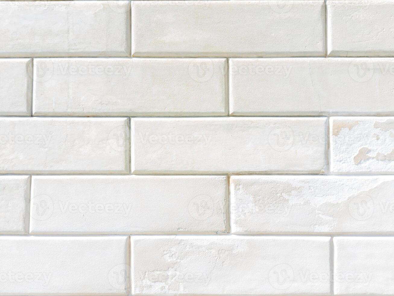 Aged White Stone Wall with Rectangular Pattern photo