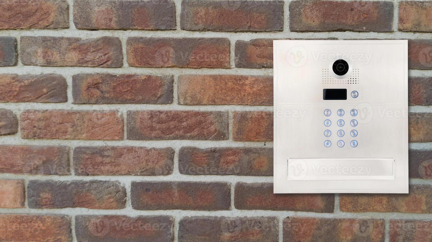 Very Modern Intercom Panel on Brick Wall photo