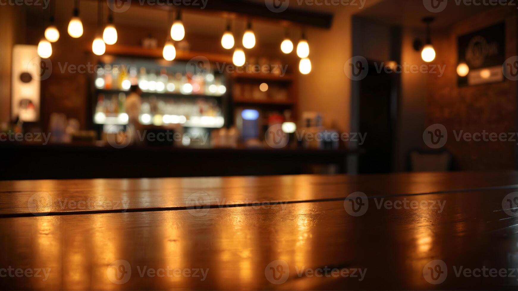 Cozy Bar Ambiance with Warm Lighting and Smooth Wooden Table photo