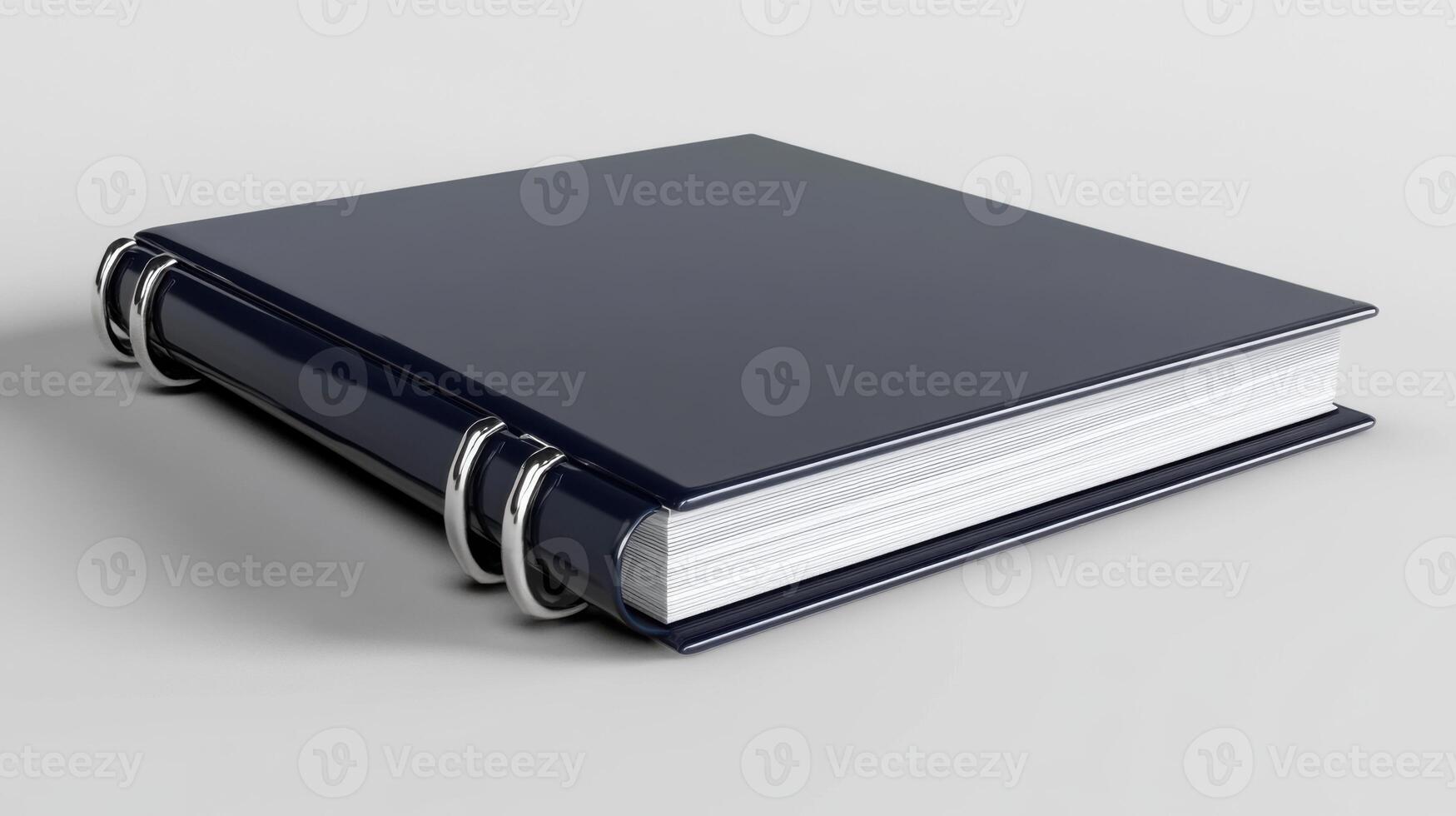 A blue book with a white cover on a white surface photo