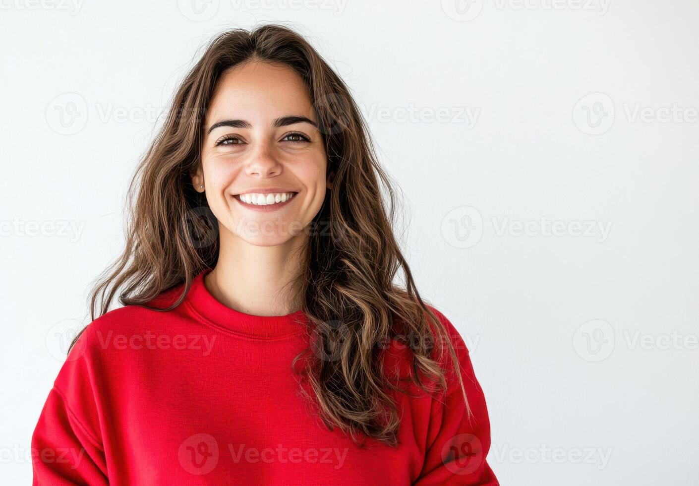 Portrait of a Smiling Woman Wearing a Red Sweatshirt Against a White Background A Happy and Confident Young Woman photo