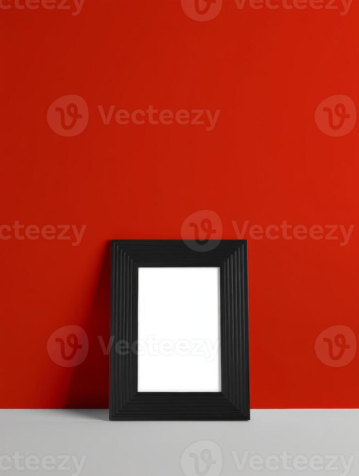 A black frame on a red wall photo