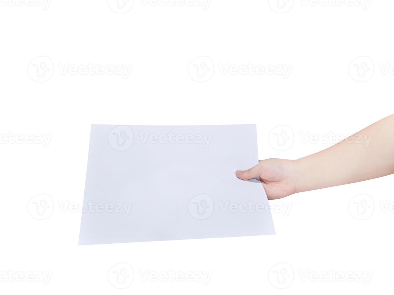 Image of child hand holding one blank white paper on white background. Mockup for design. photo