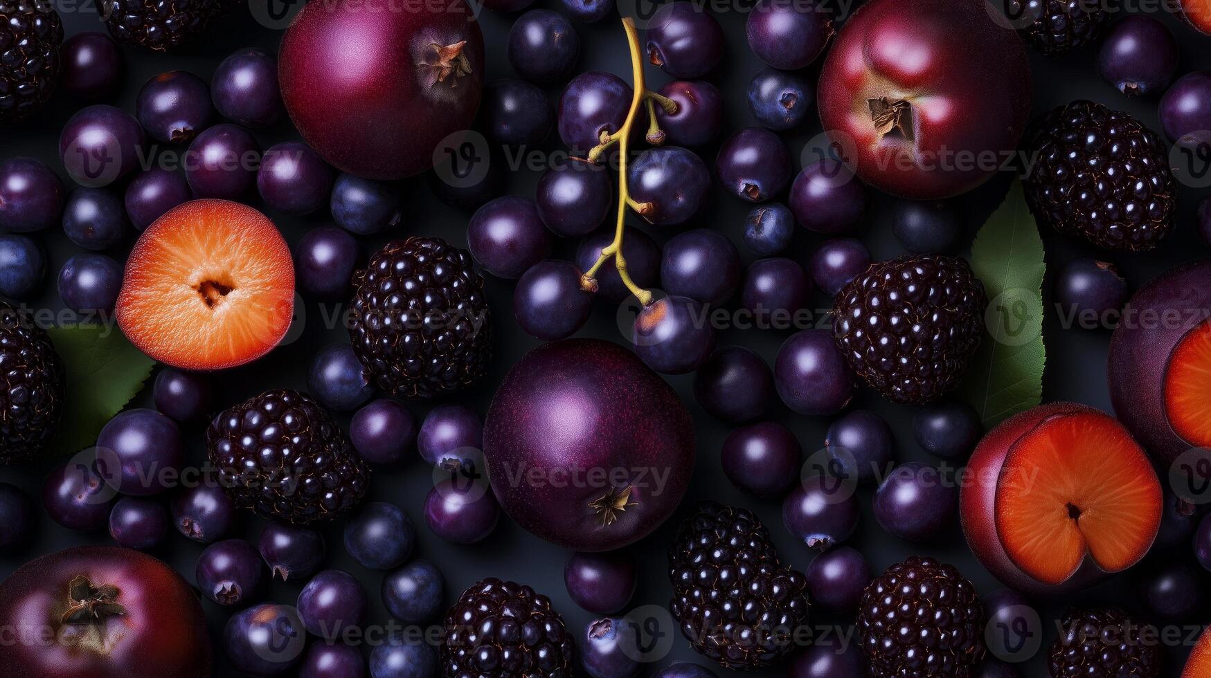 A close up of a bunch of blackberries and plums photo