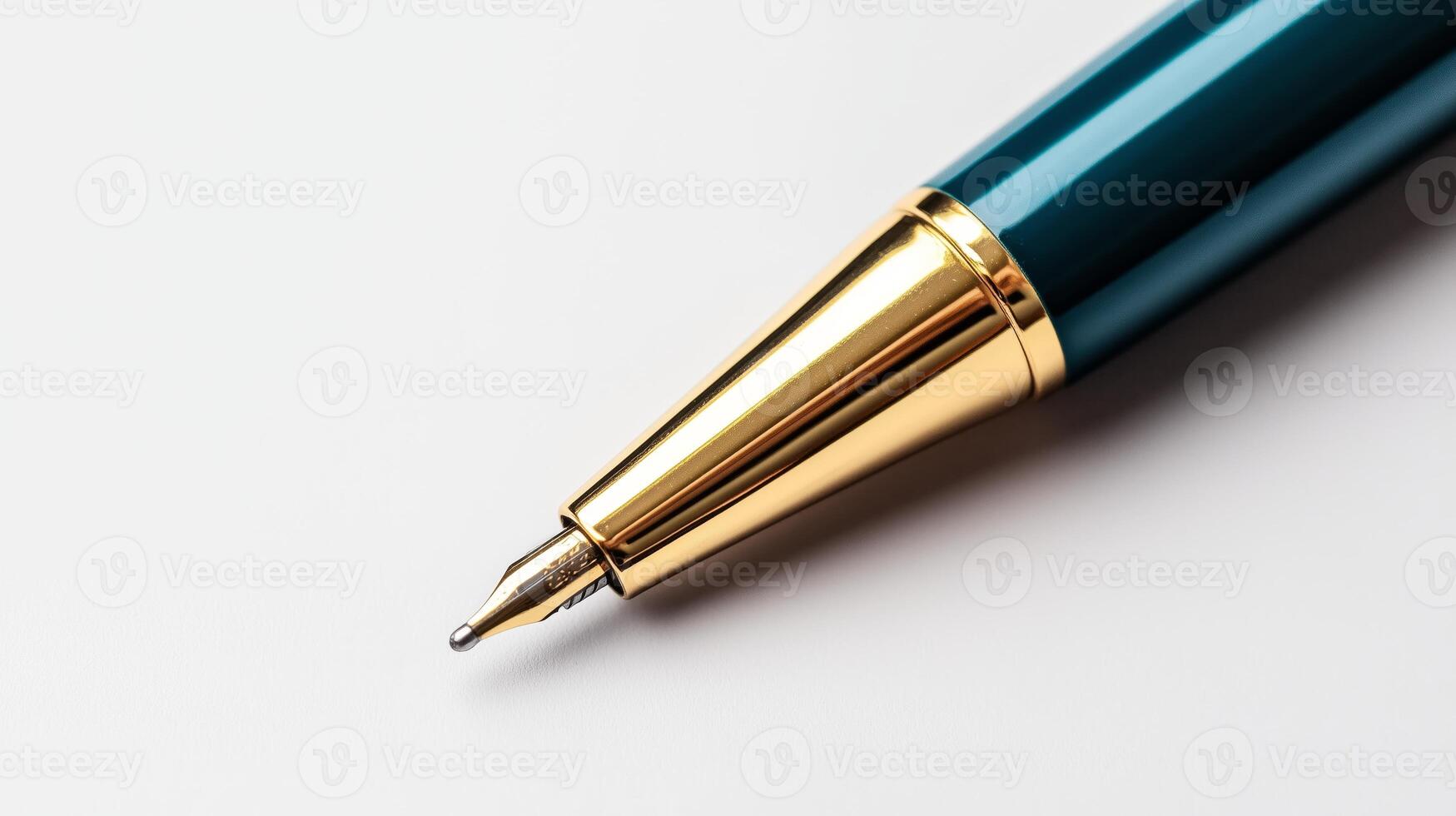 A blue pen with gold trim sitting on a white surface photo