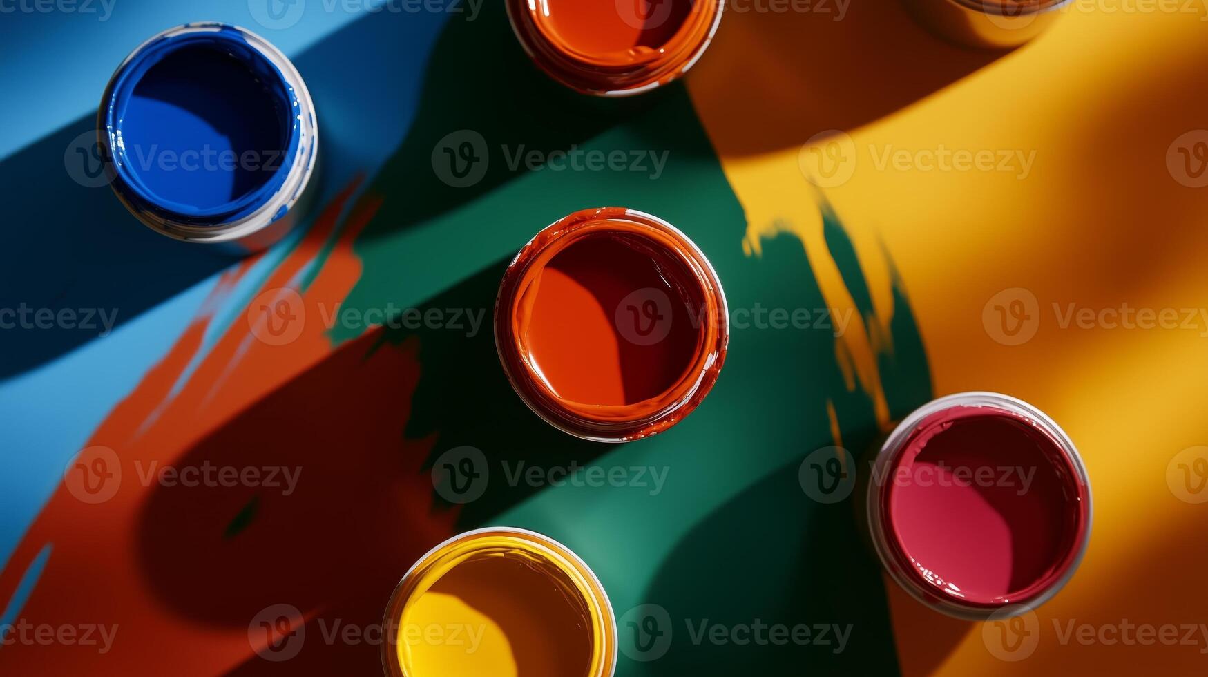 Assorted open paint cans on vibrant photo