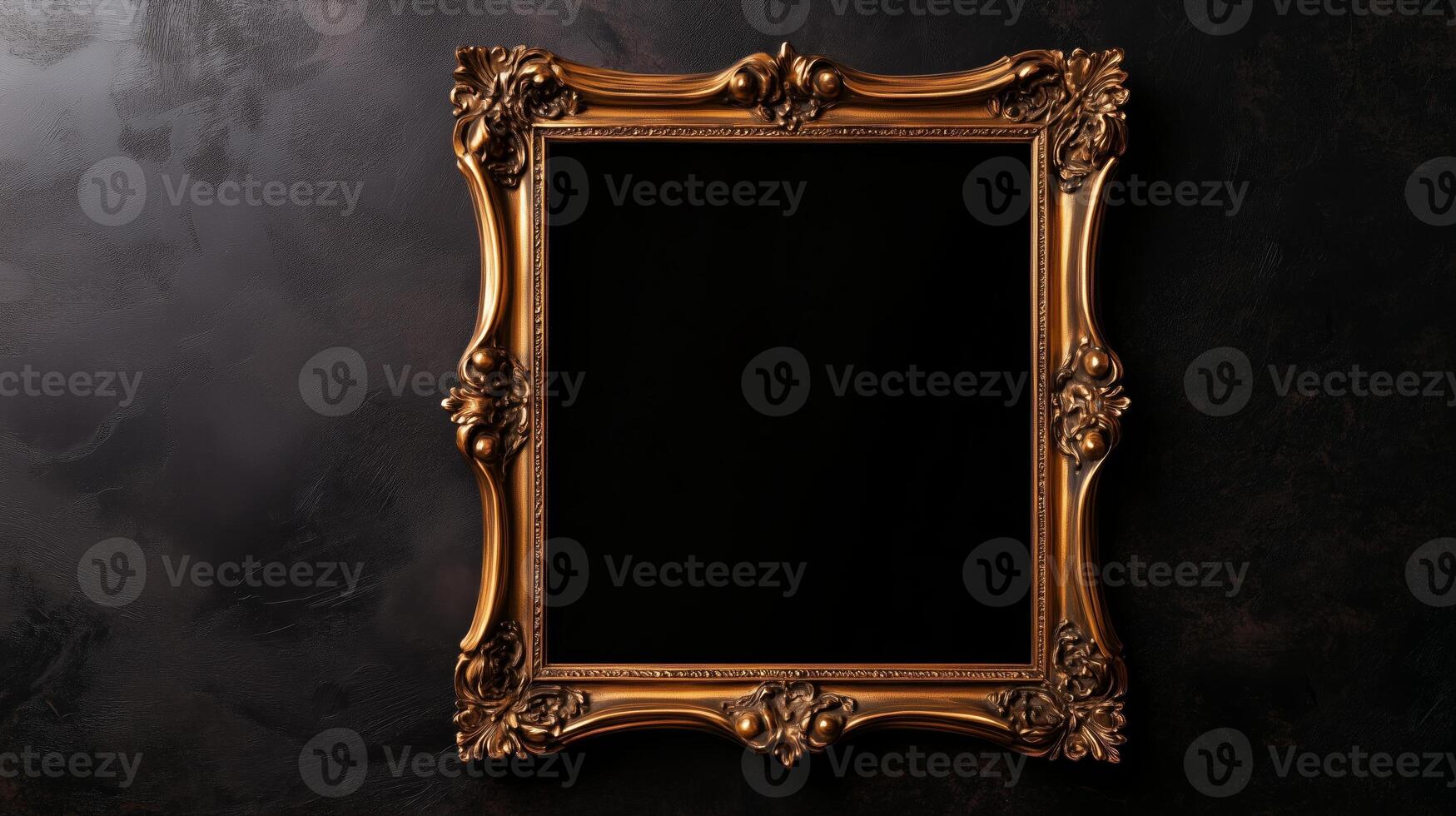 Golden frame on a black background photo