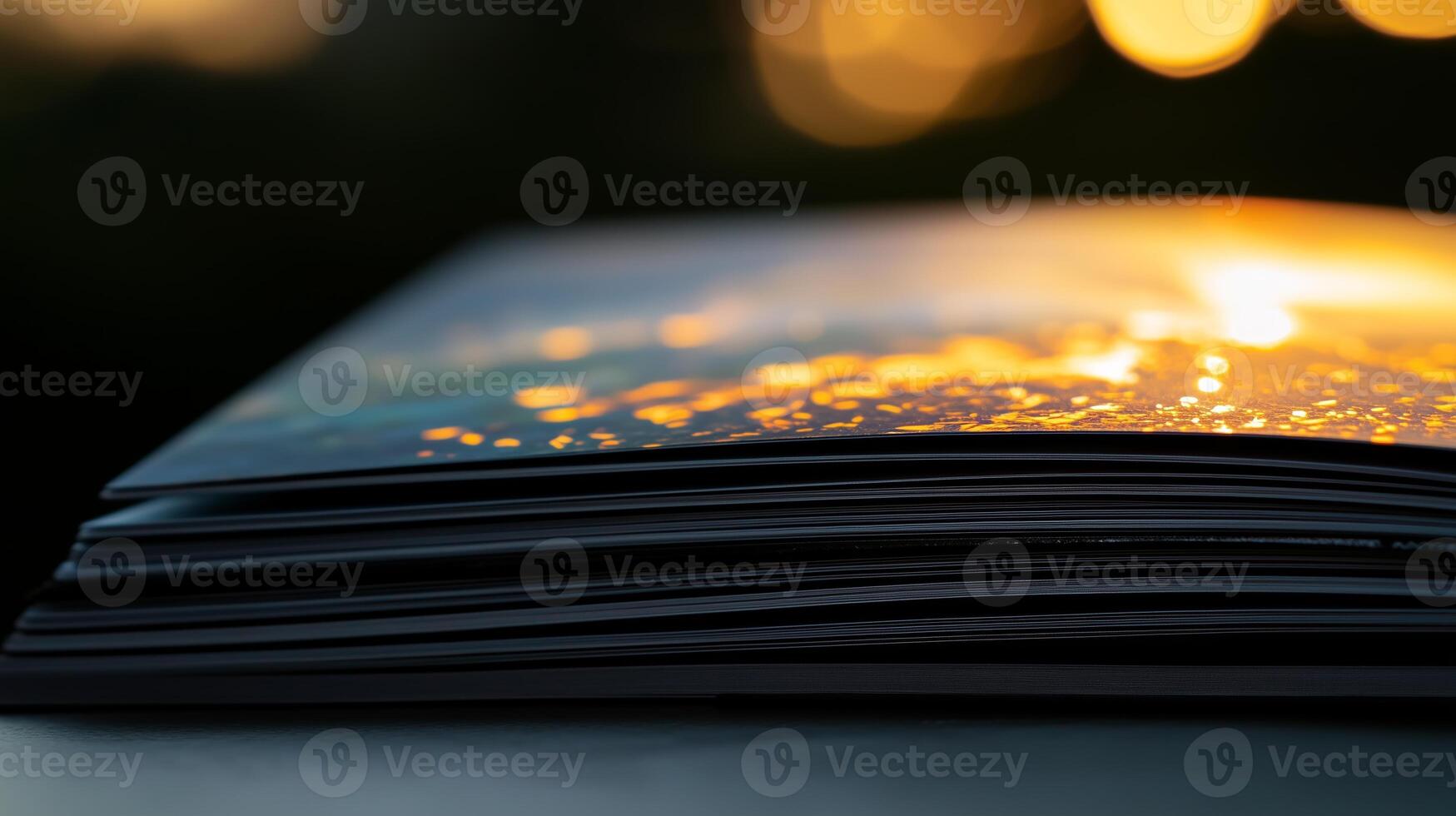A book with a picture of a sunset on it photo