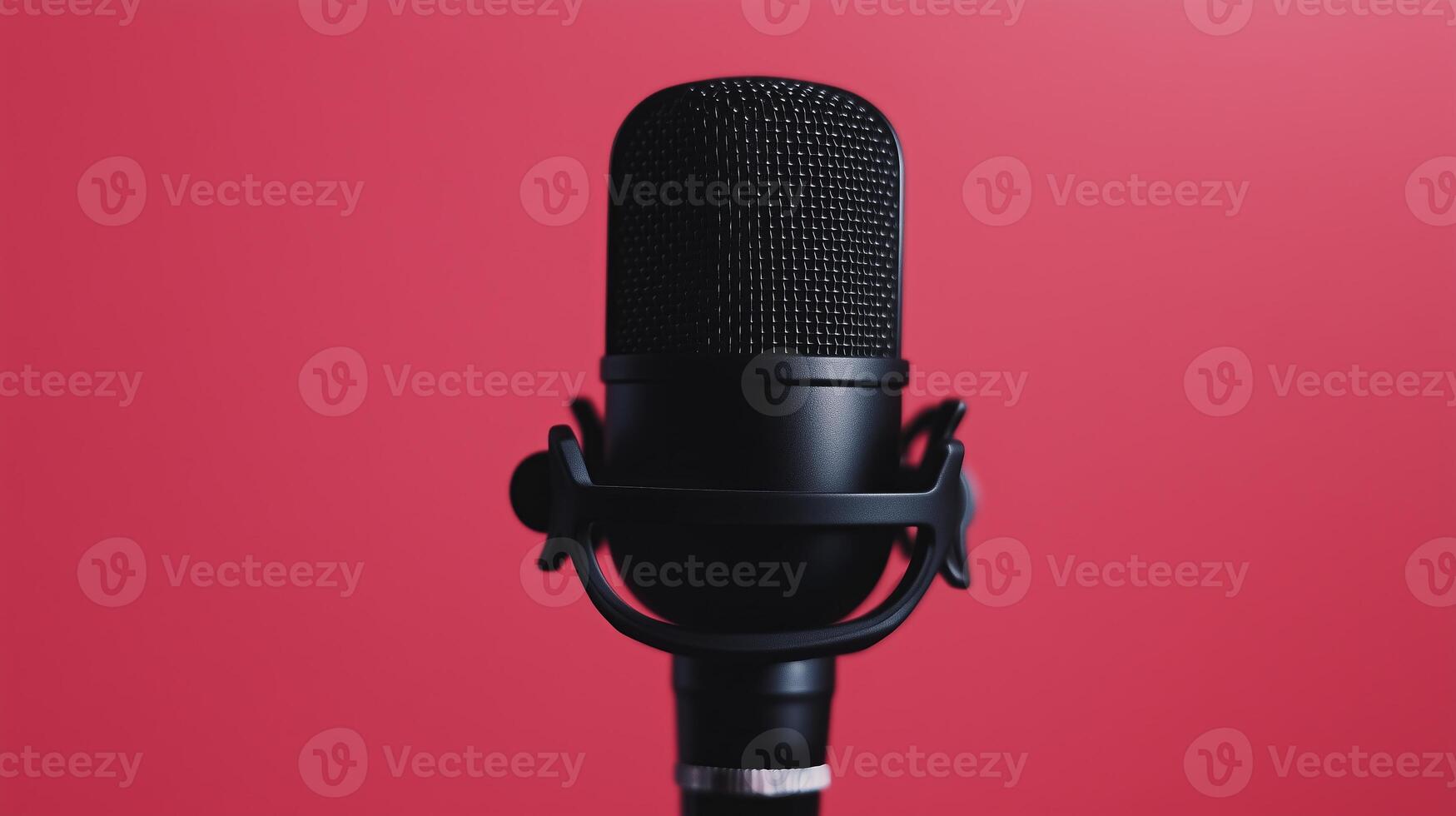 A microphone on a red background photo