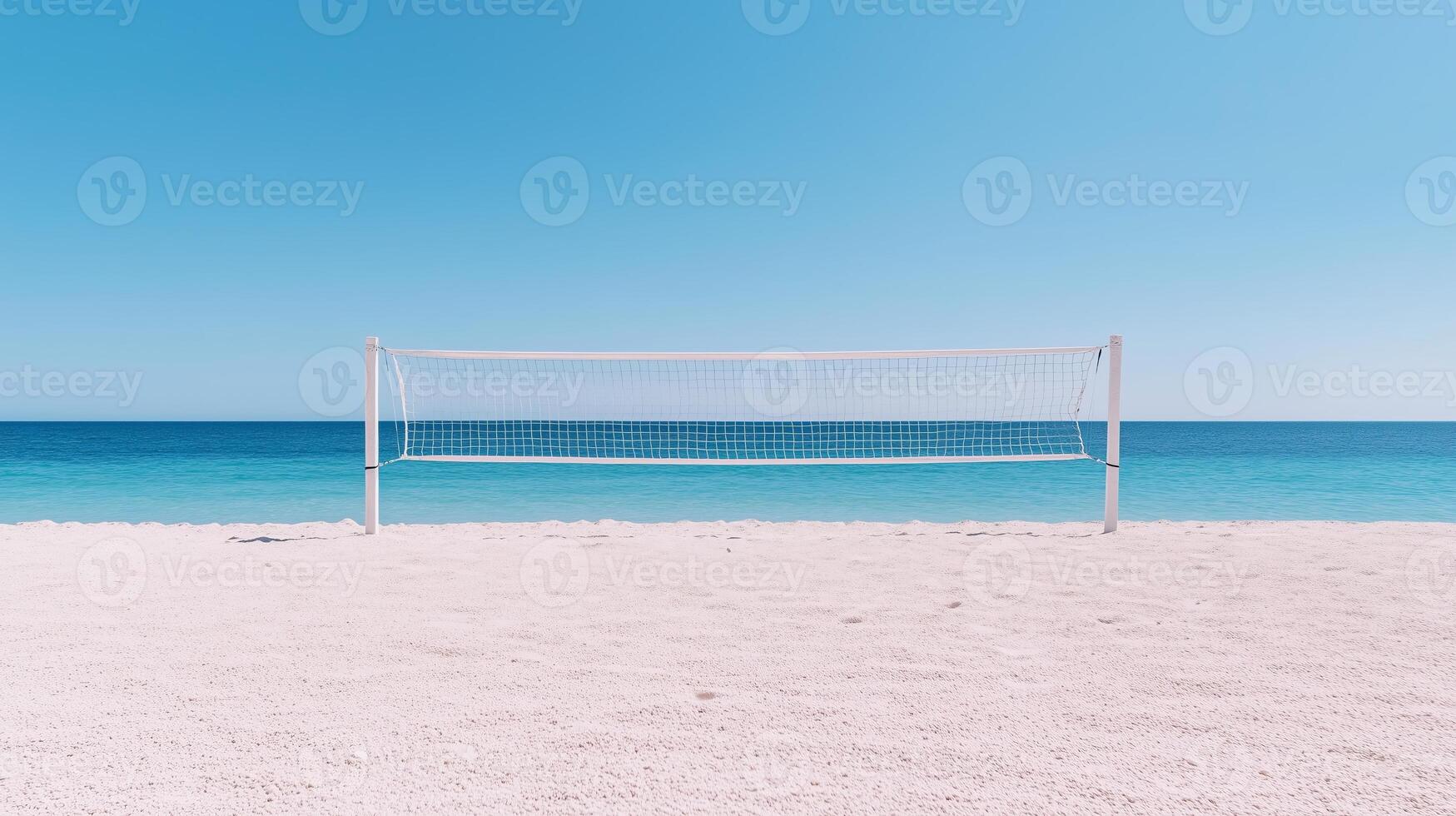 A volleyball net on the beach with the ocean in the background photo