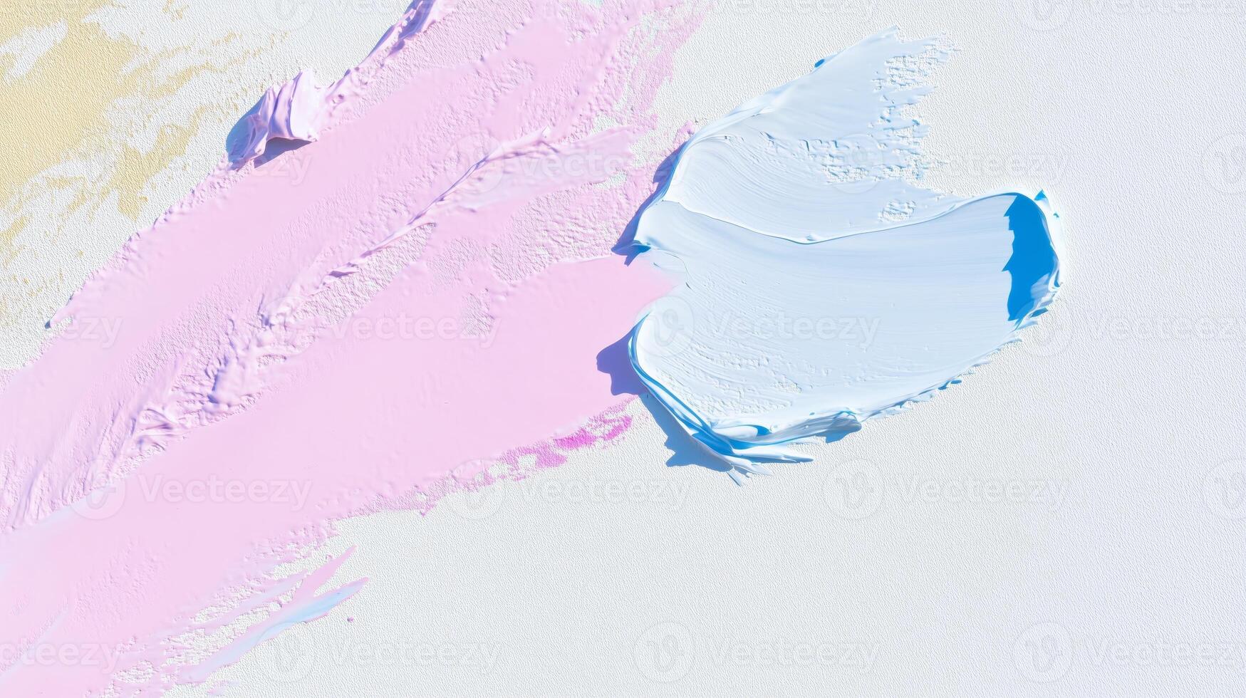 A blue and pink paint splatter on a white surface photo