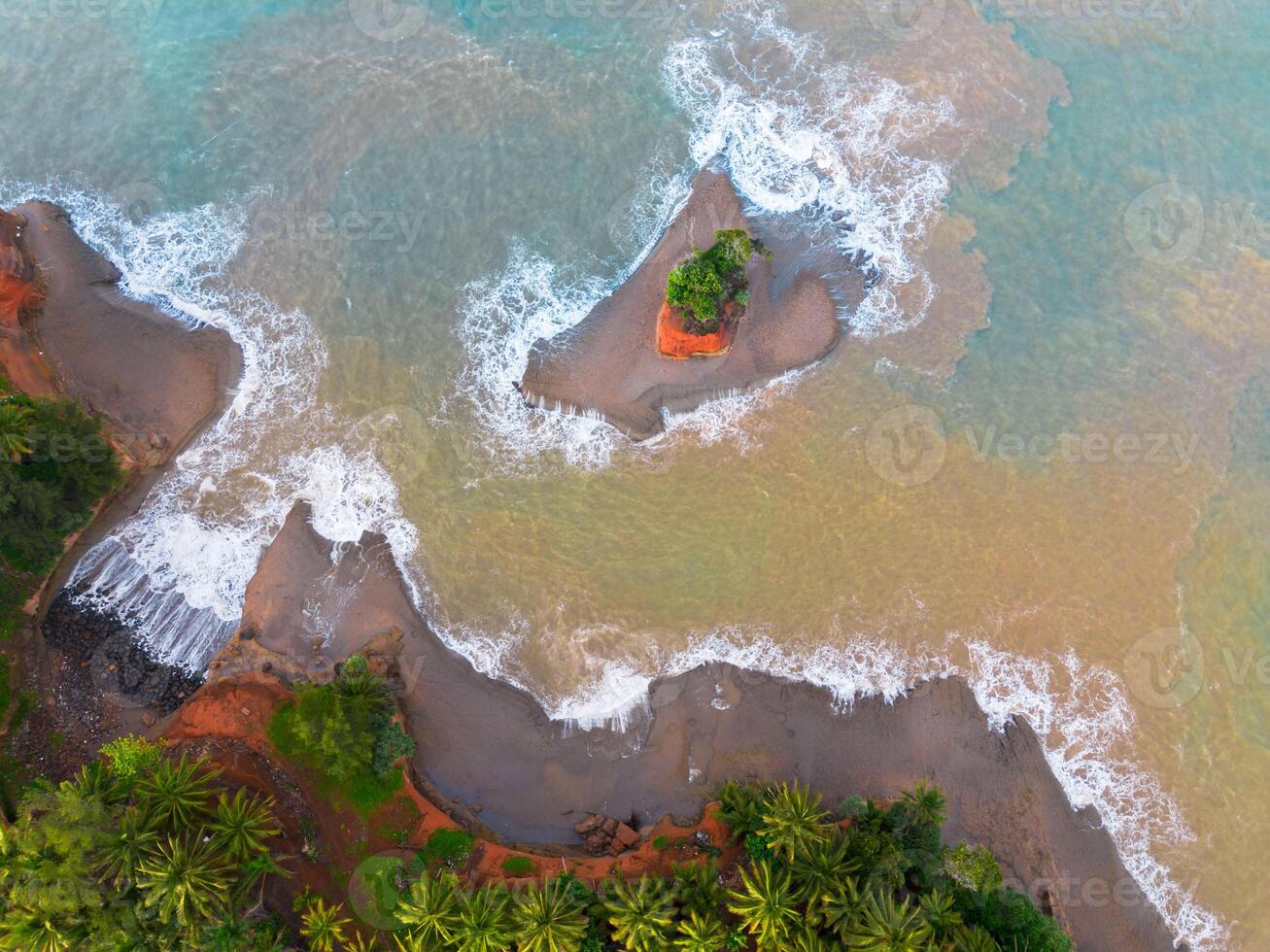 An aerial view of the ocean and beach photo