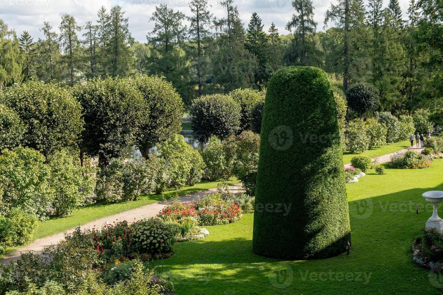 Exploring the lush gardens of Catherine Palace in Tsarskoye Selo during a sunny day photo