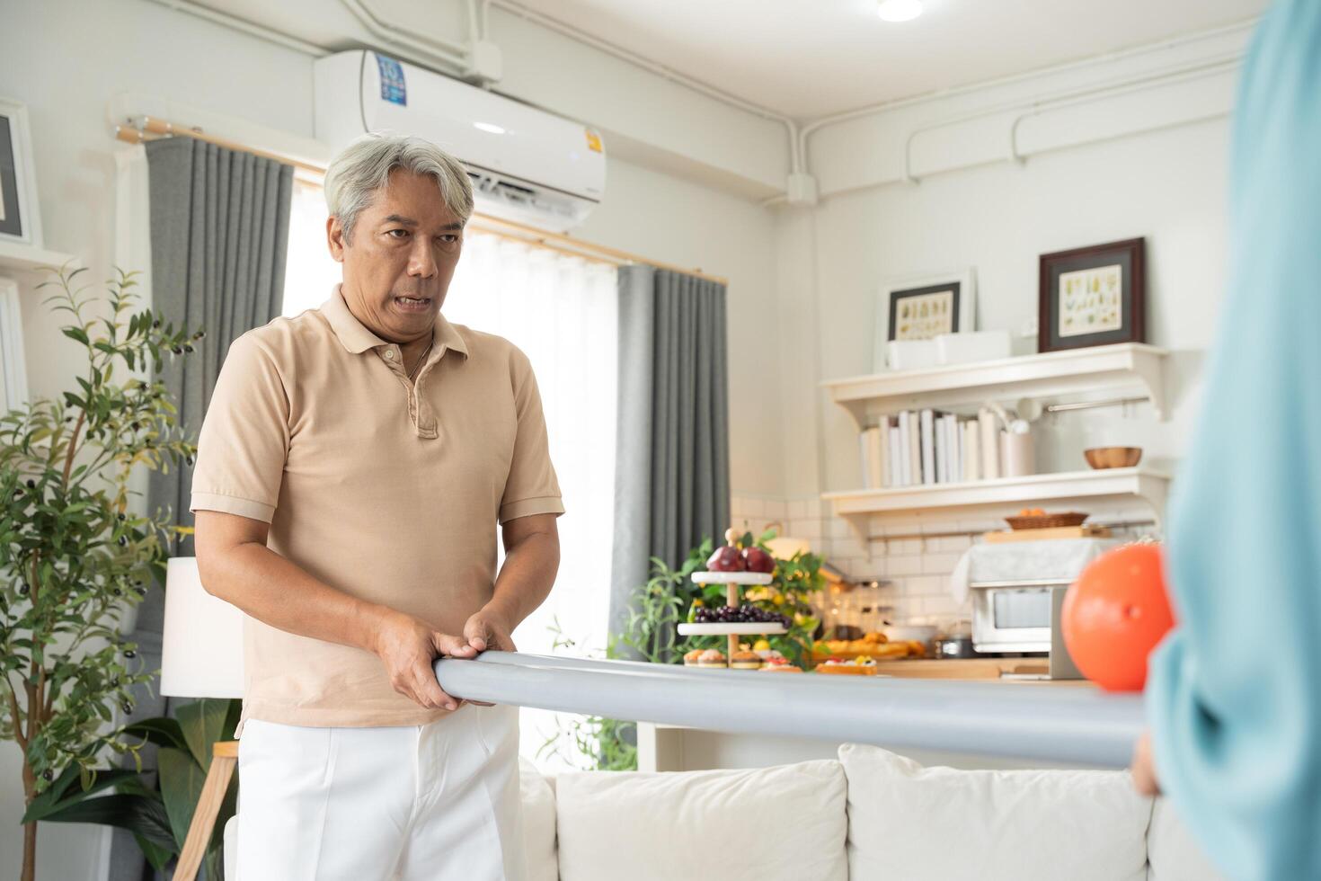 Man playing rolling ball for practice balance and concentrate at home photo