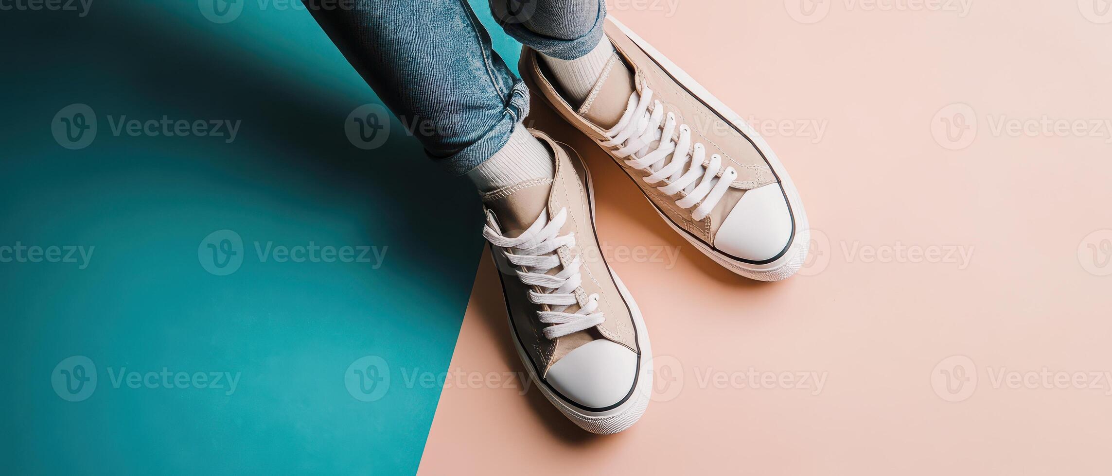 Casual sneakers on colorful background with jeans photo