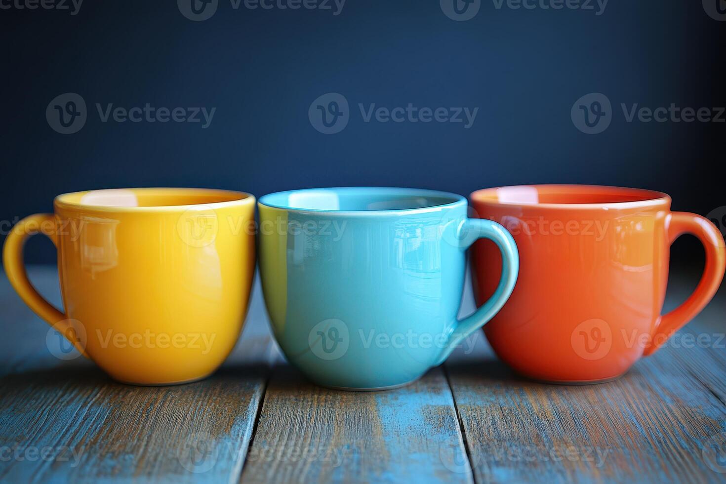 Colorful cups lined up on wooden table surface photo