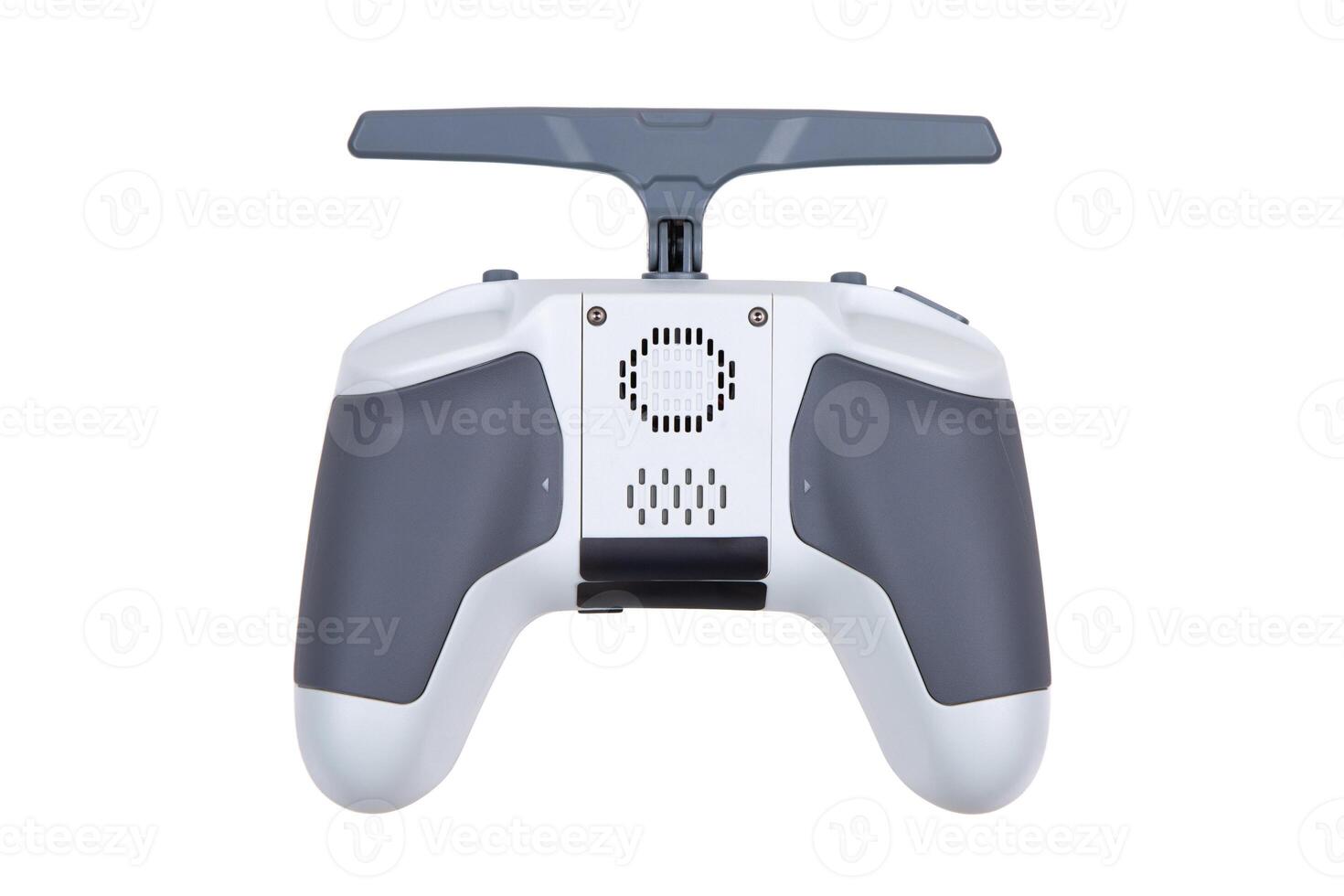 Back view of white and gray drone controller with textured grips and antenna, isolated on white back photo