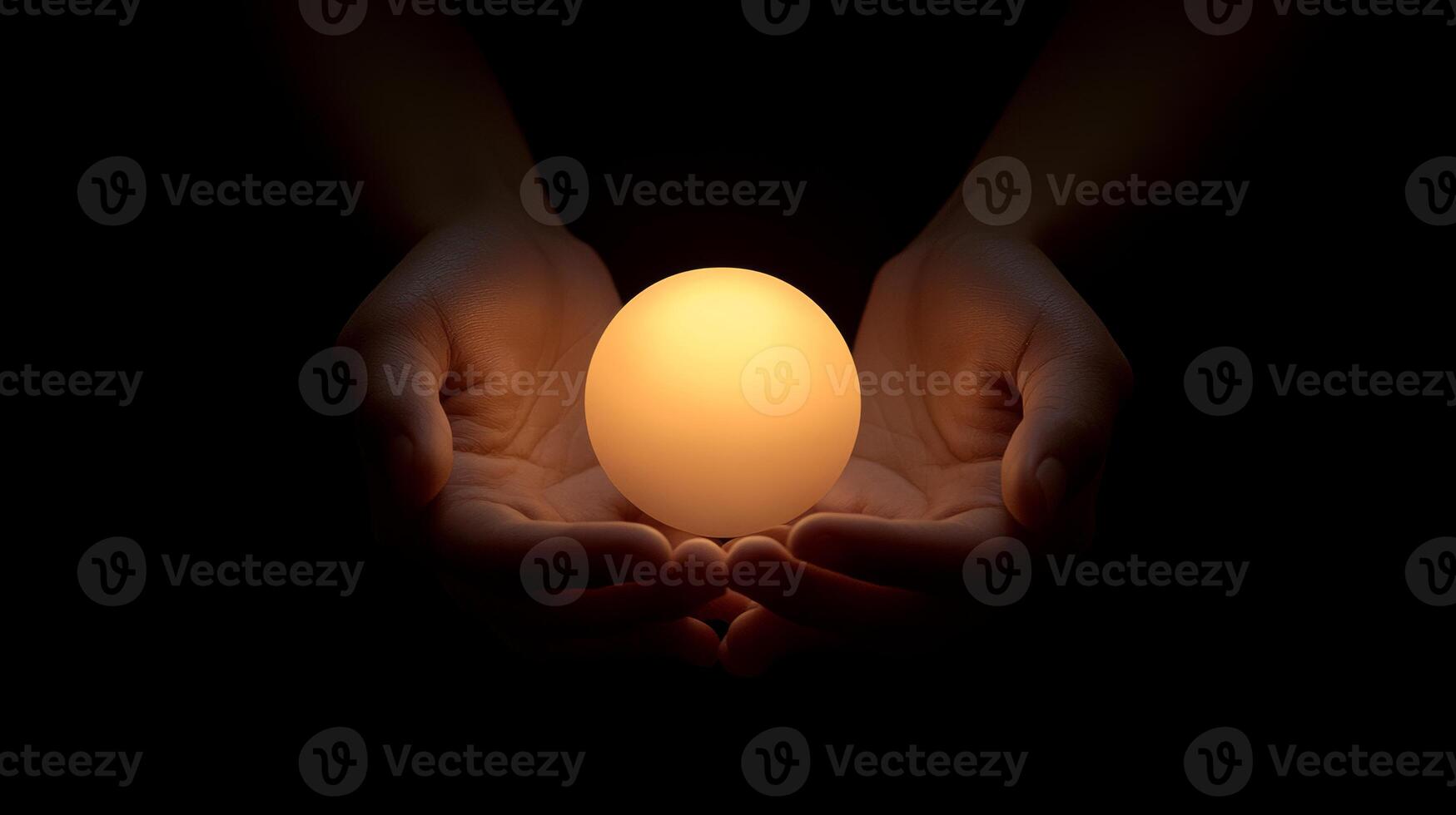 Luminous glowing sphere nestled in cupped hands, radiating warmth and potential against shadowy background, representing innovative thinking and human connection photo