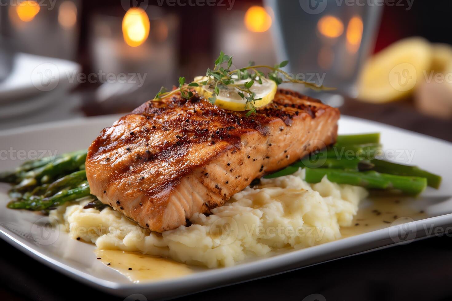 Grilled salmon fillet with mashed potatoes and asparagus. photo